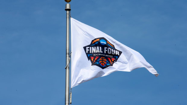 Mar 13, 2020; Indianapolis, Indiana, USA; A 2020 Final Four Atlanta flag flies above the NCAA Headquarters building following the cancellation of the Division I mens and womens 2020 basketball tournaments as well as all remaining winter and spring NCAA championships due to the Covid 19 Covid 19 coronavirus pandemic. Atlanta was to be the site of the 2020 mens Final Four. Mandatory Credit: Brian Spurlock-USA TODAY Sports
